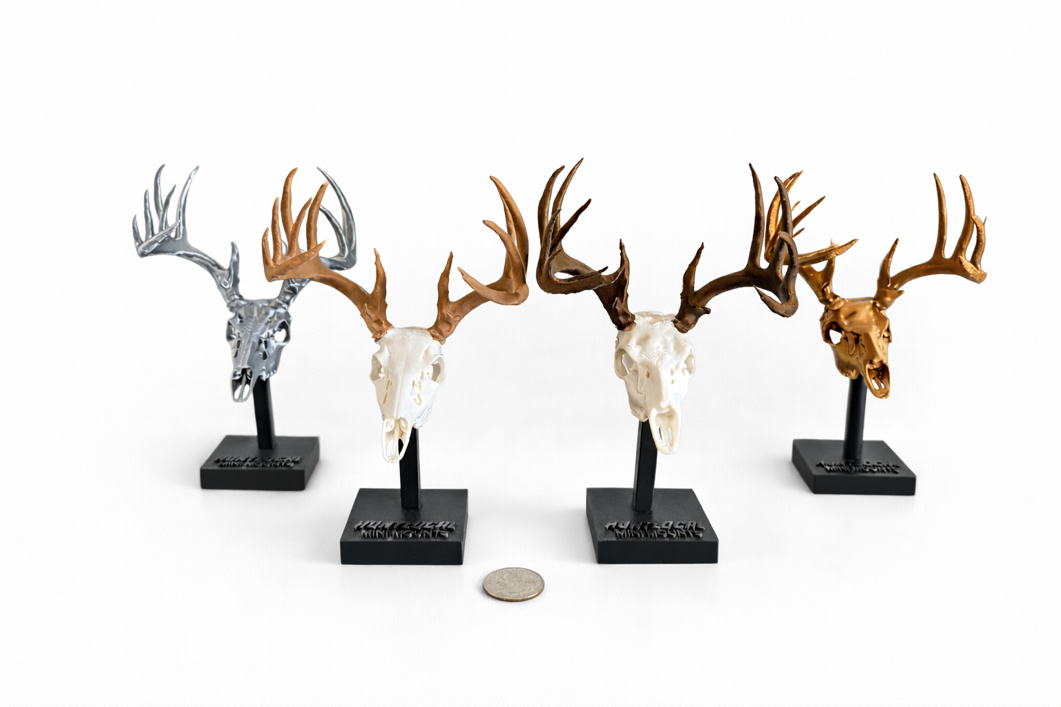 custom deer mini mounts on display — office desk and man cave shelf