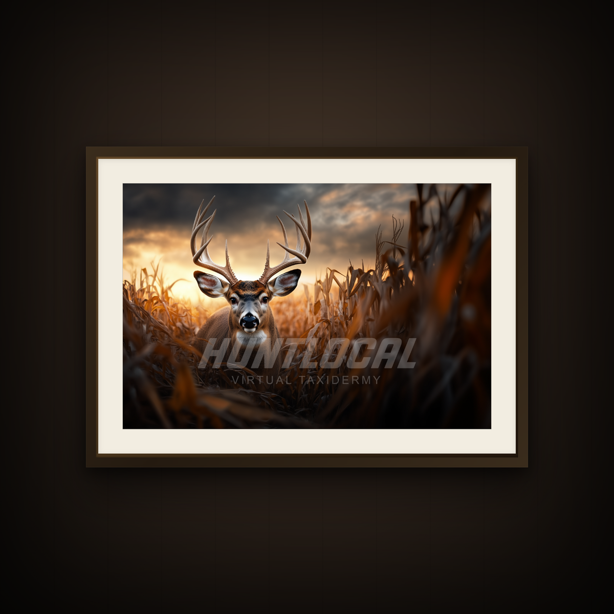 Scene 15 whitetail custom art shown as a framed print on a wall — buck above a cut cornfield at sunset